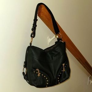 Black poly purse with gold accents, New without tags